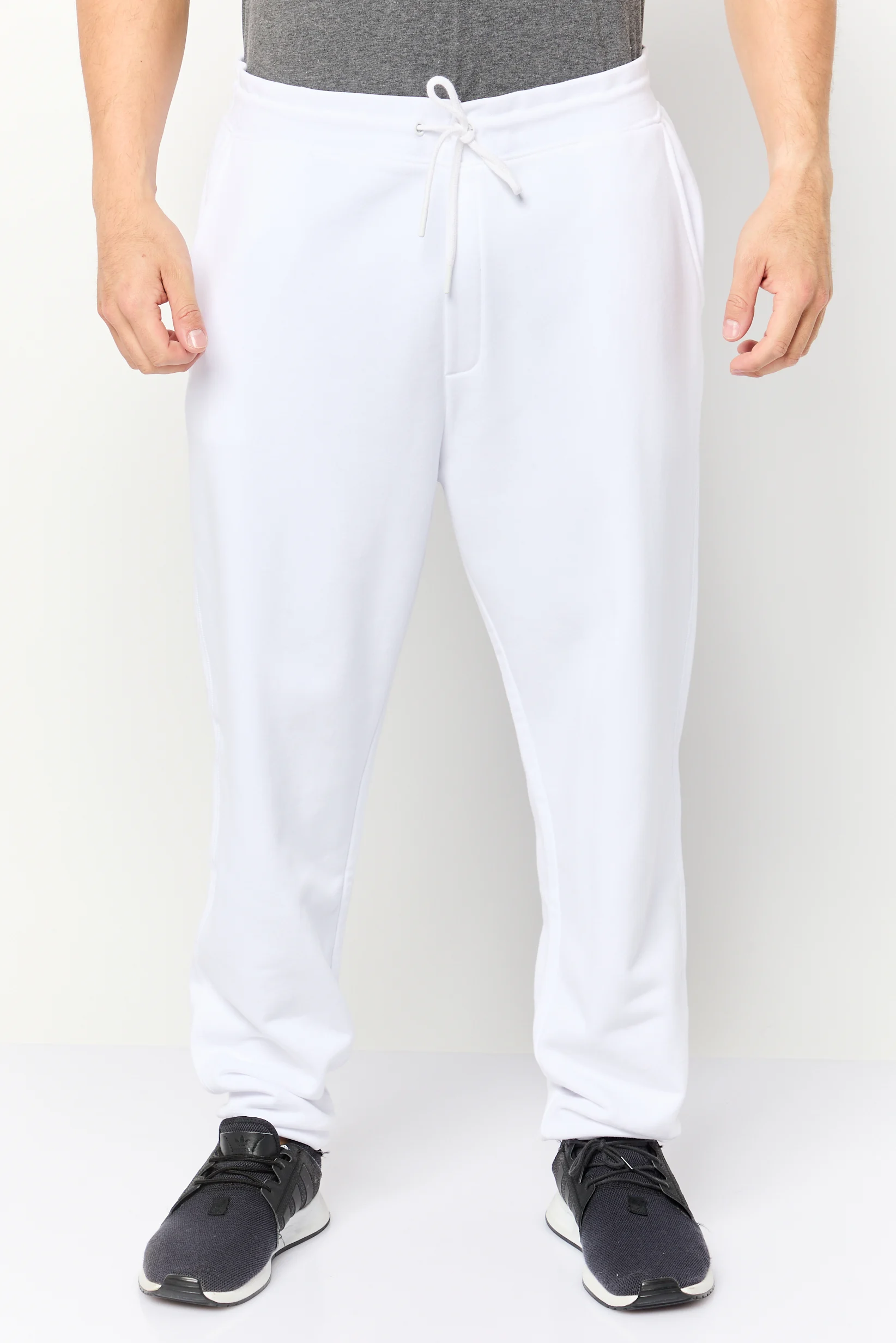 3596655957068_2 سيليو* بنطال جوغر رجالي سادة بقصّة عادية، ابيض