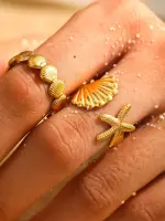 طقم خواتم ستانلس ستيل – تصميم نجمة بحر وصدفة – بسيط وأنيق للنساء