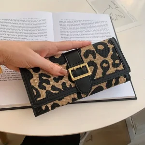 محفظة نسائية بتصميم كلاسيكي أنيق وطبعة جلد النمر، ثلاث طيات وإغلاق بزر 3 28bb654b3c794c4aaefb7b67c512a570 goods