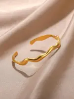 سوار موجة نسائي مفتوح من الستانلس ستيل الذهبي