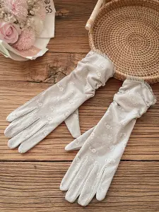 قفازات نسائية صيفية طويلة بدون أصابع، حماية من الشمس ولمس الشاشة، مرنة وتناسب مختلف قياسات الأذرع 2 1741514991a0ce58e57c4b73cc4af455b22a106aee