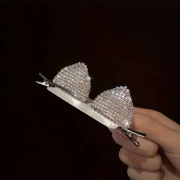 مشبك شعر نسائي جانبي على شكل آذان قطة مزين بأحجار لامعة