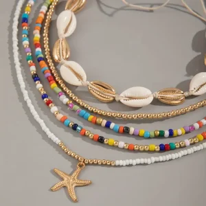 طقم مجوهرات بوهيمي 12 قطعة، أصداف ونجوم بحر بألوان عشوائية لإطلالة صيفية مميزة 5 c1132eea 3d64 4ef8 986a 079ff5b
