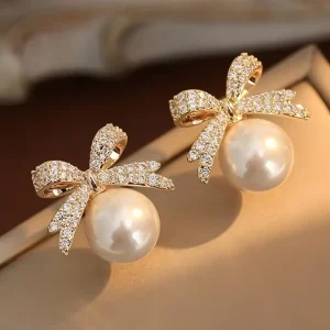 أقراط متدلية نسائية فاخرة بتصميم رباط لامع مع لؤلؤ صناعي، هدية راقية للمناسبات، تضيف لمسة فاخرة وفريدة لأي إطلالة مسائية أو احتفالية 4 af6b57b5d42f493eb0779802b69bb705 goods