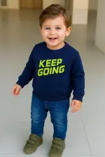 سويت شيرت أولادي كحلي بكتابة KEEP GOING صفراء