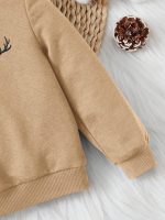 سويت شيرت أطفال بيج، سويت شيرت أطفال، سويت شيرت بيج، ملابس أطفال، قرون غزال، ملابس شتوية، ملابس كاجوال، ملابس أولاد، ملابس بنات، خامة قطنية