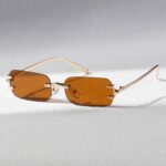 نظارة "الرؤية الذهبية" (Golden Vision) – تصميم مستطيل بدون إطار (Rimless) – عدسات بنية وإطار ذهبي (متجر تَسَوق)
