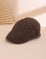 قبعة "الأناقة الكلاسيكية" (Classic Flat Cap) – تصميم بيريه أنيق – متوفرة بالألوان: الأسود، البني، والأبيض (متجر تَسَوق)