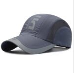 قبعة "الأداء الاحترافي" (Pro Performance Cap) – تصميم رياضي بتقنية التهوية – متوفرة باللونين الرمادي والأبيض (متجر تَسَوق)