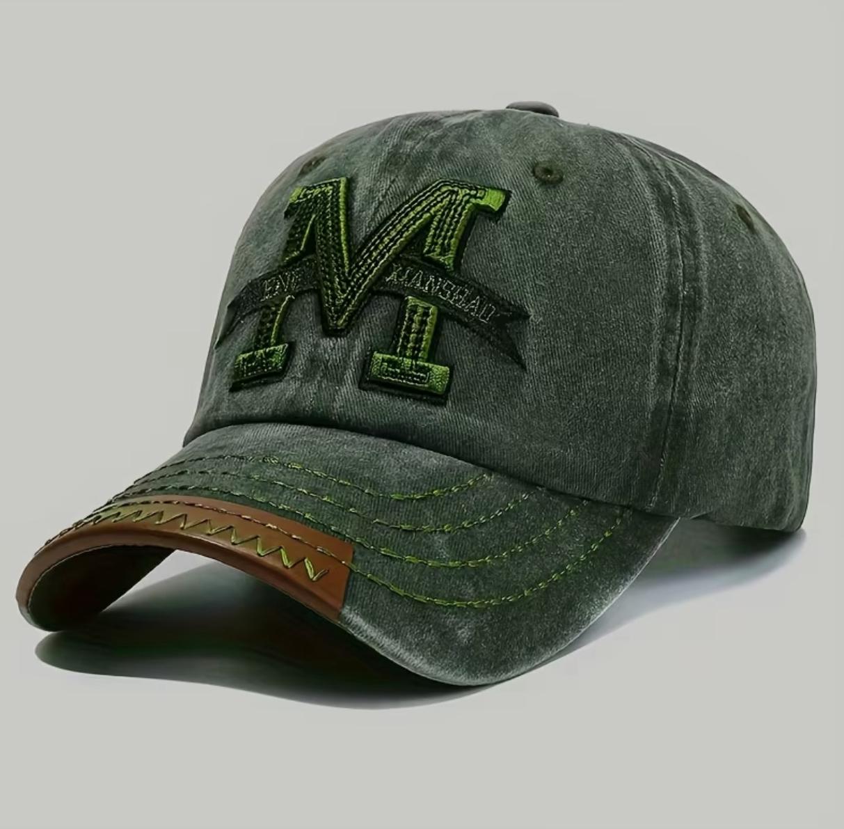 قبعة "الحرف M العتيقة" (Vintage M Cap) – تصميم مغسول مع لمسة جلدية على الحافة – لون أخضر زيتي (متجر تَسَوق) قبعة "الحرف M العتيقة" (Vintage M Cap) – تصميم مغسول مع لمسة جلدية على الحافة – لون أخضر زيتي (متجر تَسَوق)